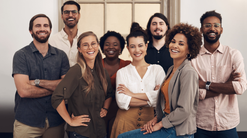 Portrait of a group of businesspeople standing together in an office
